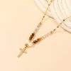 Niche Beaded Cross Necklace